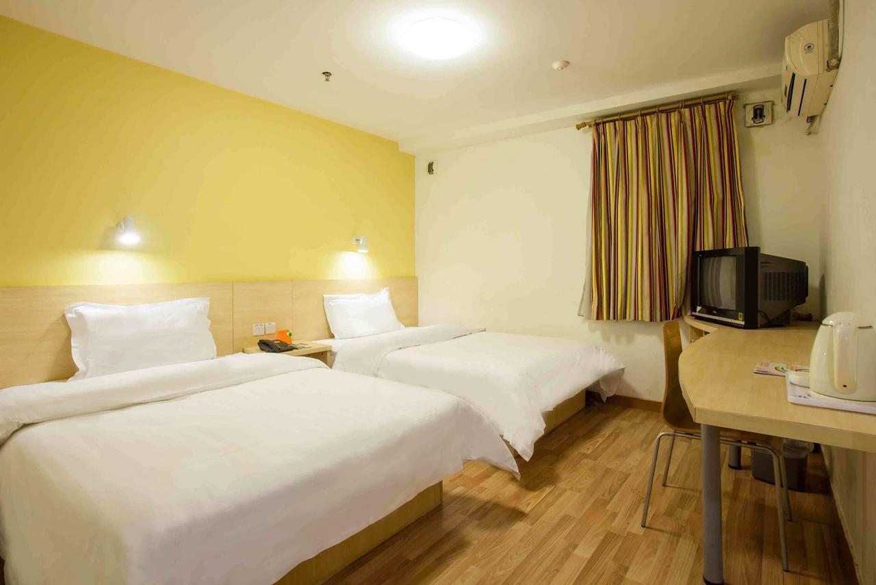7Days Inn Lingshui Beidou Road Стая снимка