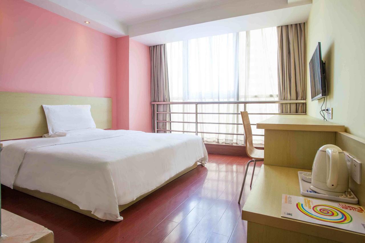 7Days Inn Lingshui Beidou Road Стая снимка